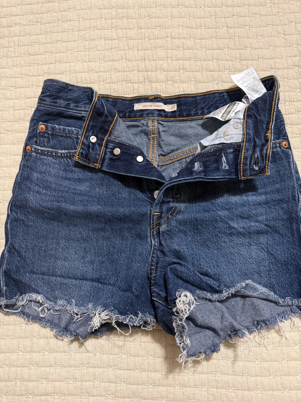 Levi's Dark Blue Frayed Denim Cutoff Shorts
